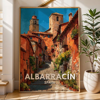 Framed picture of Albarracin, Spain on a wall next to a staircase