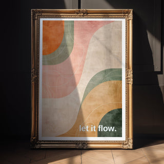 Framed abstract art print with 'let it flow.' text on a dark wall.