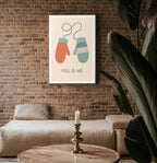 You & Me Mittens poster mockup shown on a gallery wall
