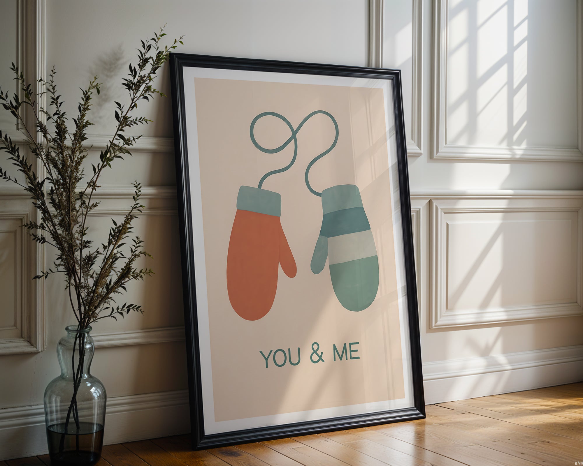 You & Me Mittens poster displayed in a cosy interior setting