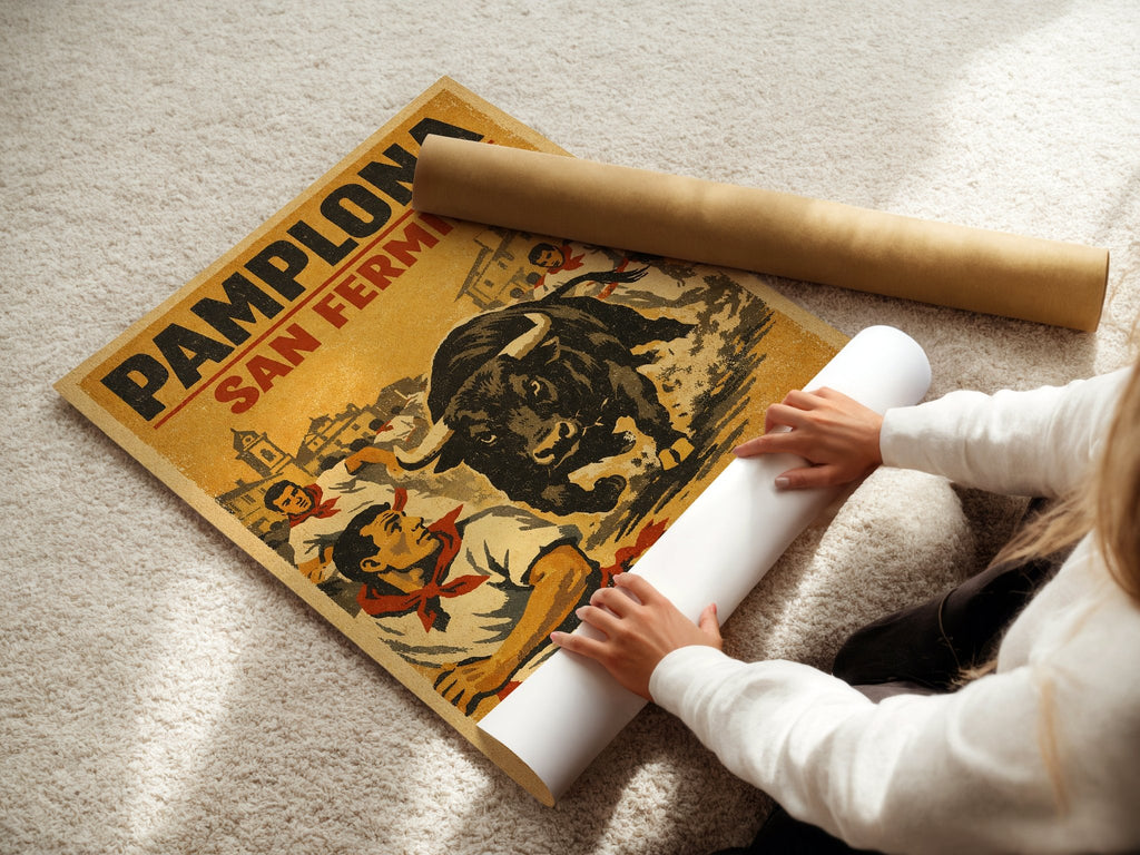 Pamplona San Fermín poster displayed in a styled room setting