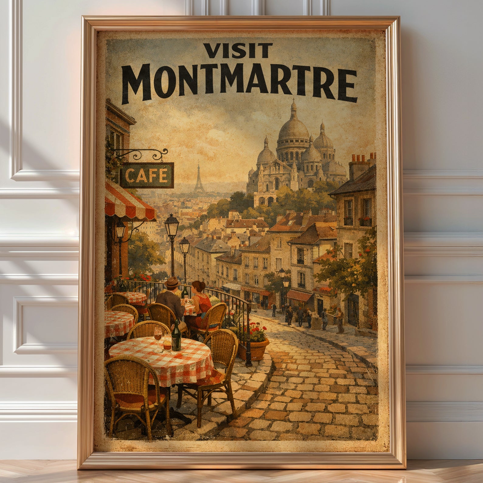 Vintage 'Visit Montmartre' poster of a Paris café terrace with the Sacré-Cœur basilica in the background