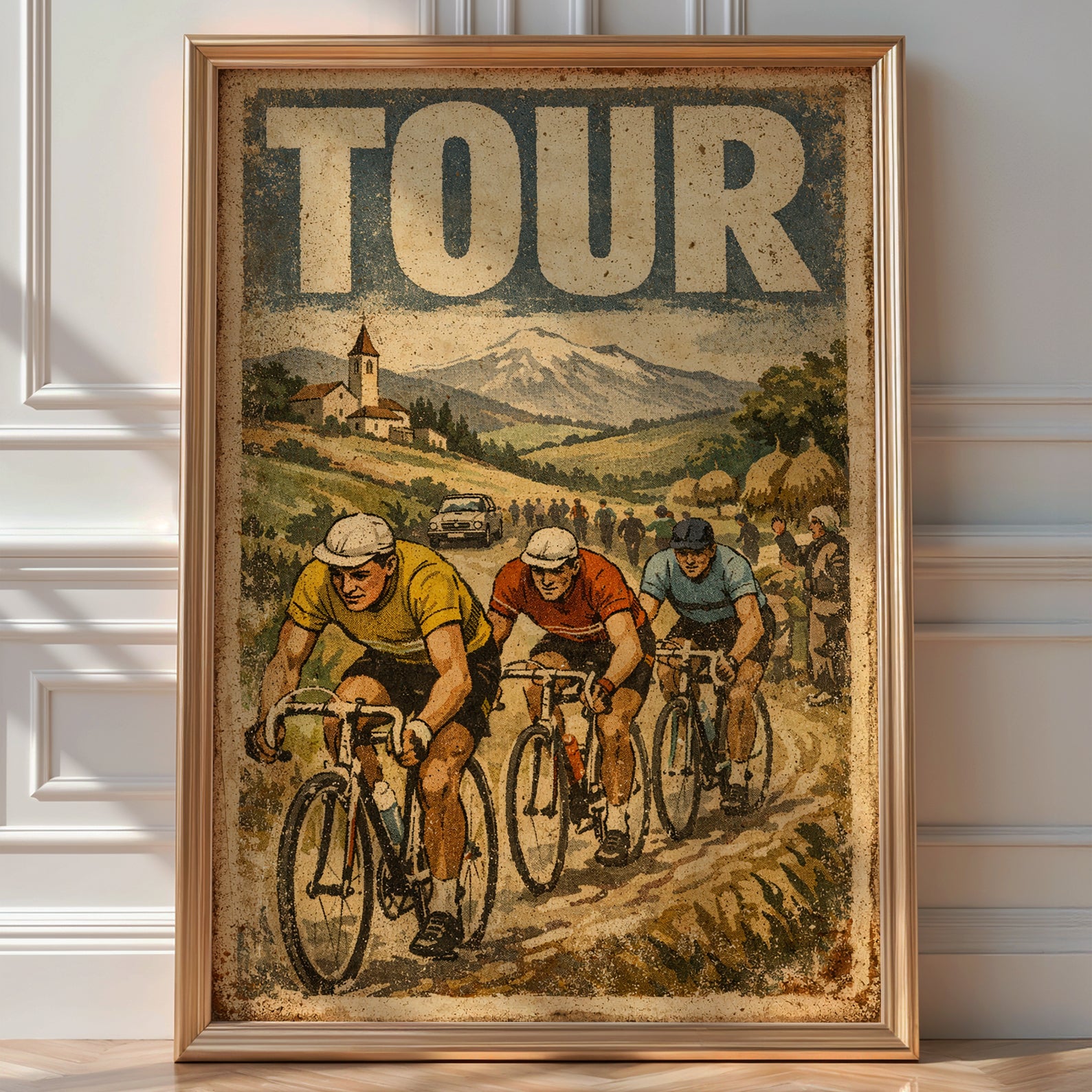 Vintage 'Tour' cycling poster of three racing cyclists on a mountain road past a church and snow-capped peak