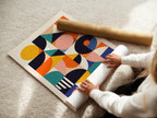 Bauhaus Shapes poster displayed in a styled room setting