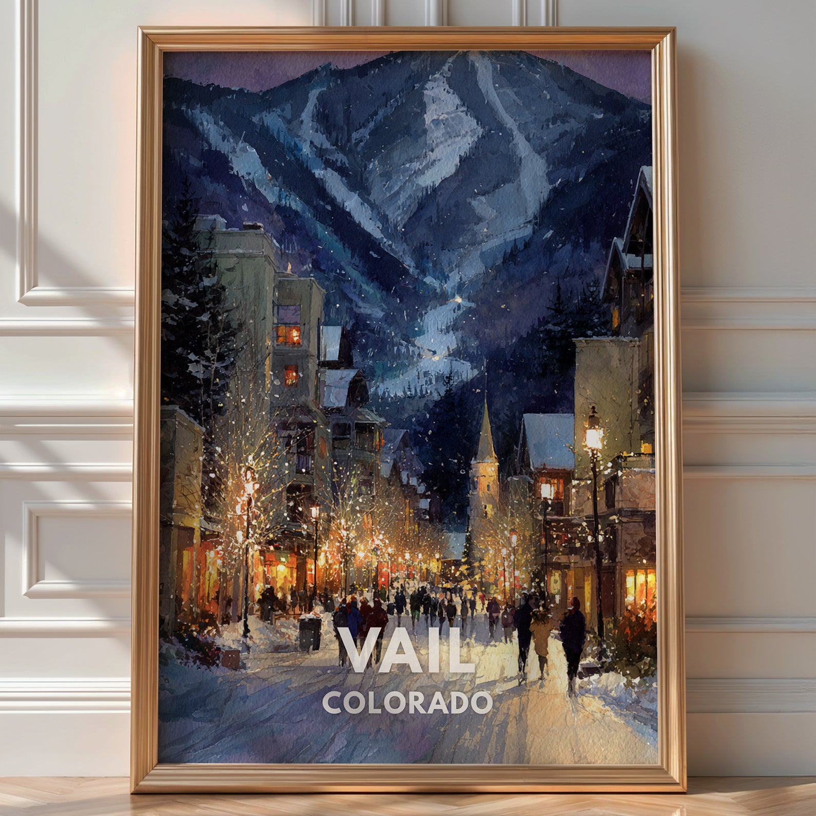 Illustrated 'Vail Colorado' poster of a snowy ski town street lit up at night beneath the mountain