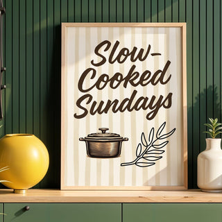 Decorative wall art with 'Slow-Cooked Sundays' text in a kitchen setting.