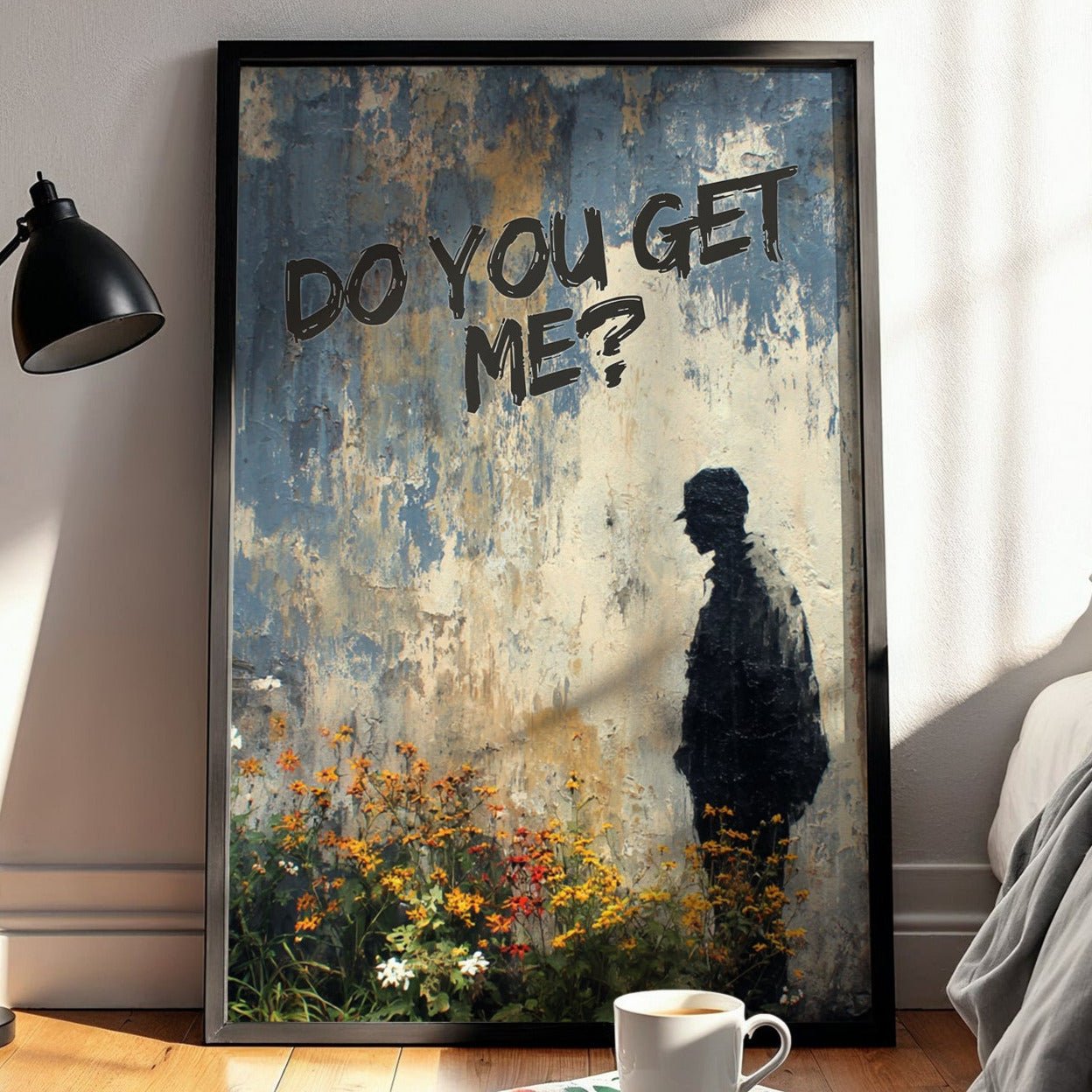 Framed artwork with a silhouette and text in a bedroom setting